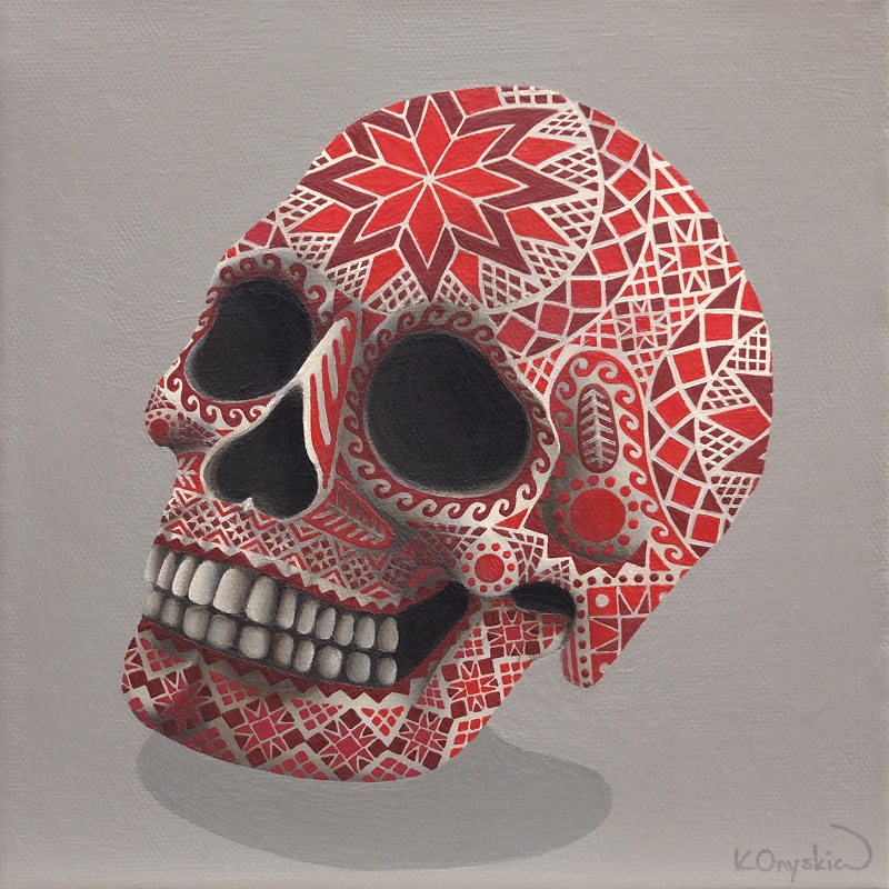 A painting of a skull covered in red and burgundy patters, similar to the patterns found on pysanky